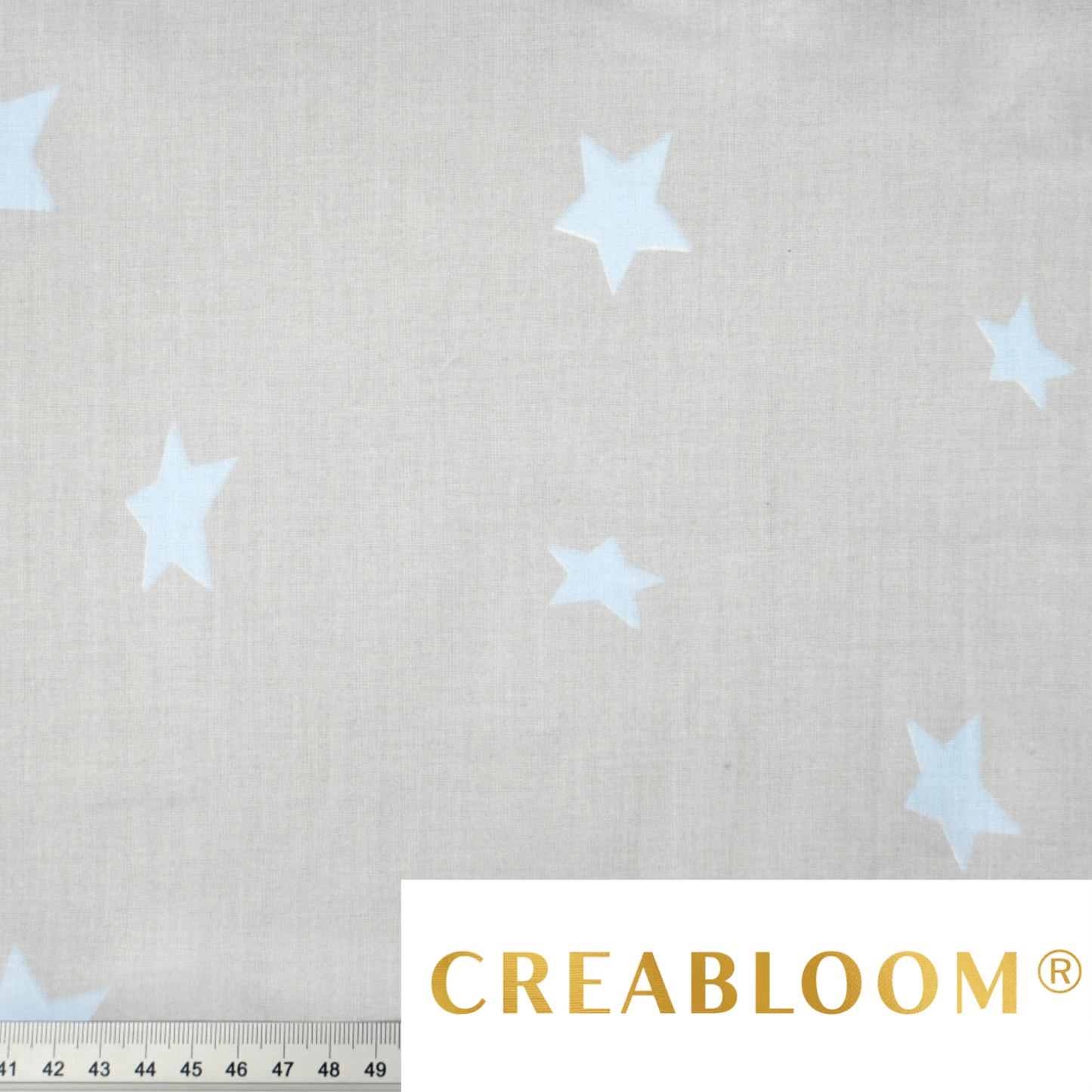 Tela de algodón con estampado de estrellas.