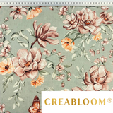 Tissu coton imprimé fleurs orange et marron sur fond olive