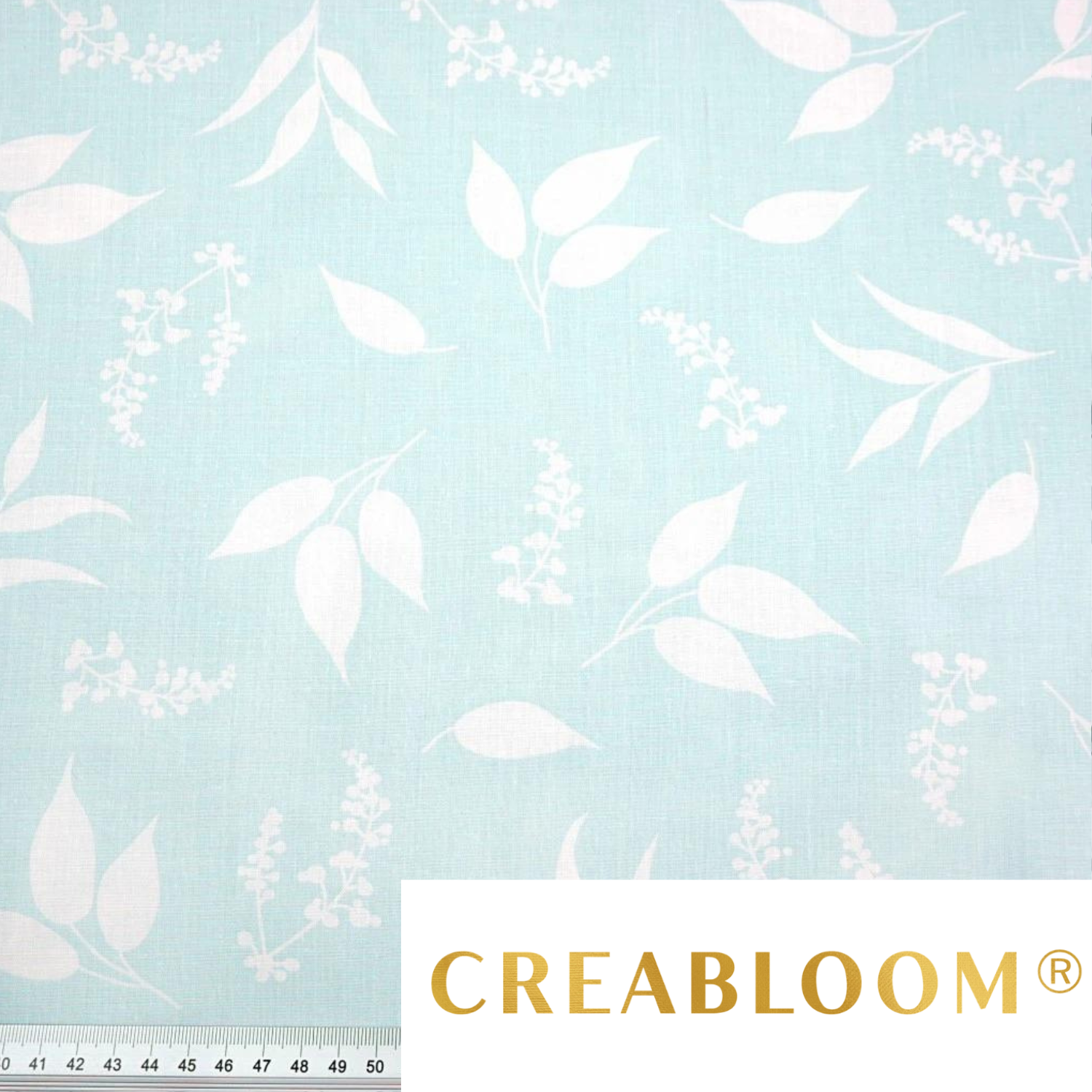 Tissu Coton Imprimé Feuilles Blanches Fond Bleu