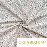 Tissu coton imprimé fleurs couleur bordeaux