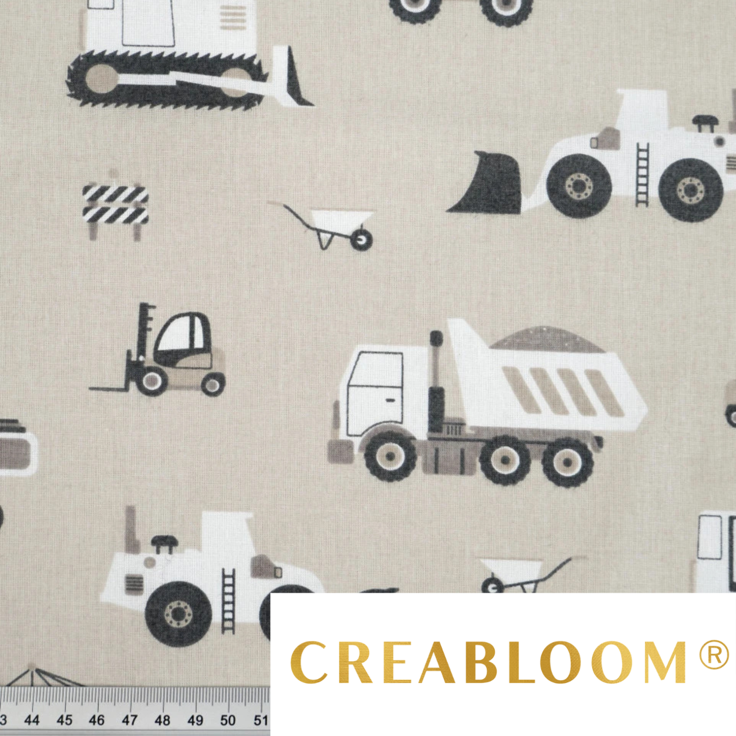 Tela de algodón con estampado de vehículos de construcción.